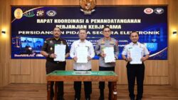 Sidang Elektronik, Kakanwil Hadiri Rapat Koordinasi dan Penandatangani PKS Bersama APH