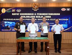 Sidang Elektronik, Kakanwil Hadiri Rapat Koordinasi dan Penandatangani PKS Bersama APH